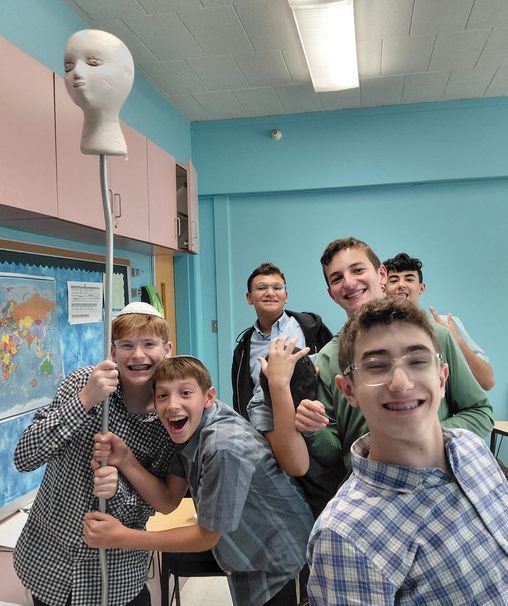 World History students reenacted the Reign of Terror from the French Revolution while learning about the guillotine.